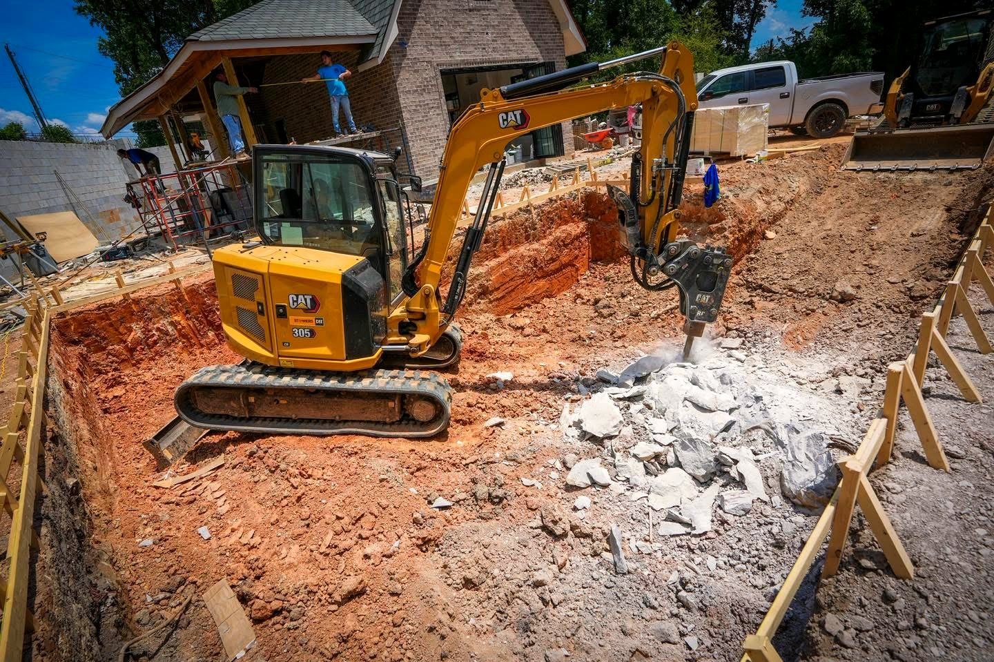 Excavator digging a new pool