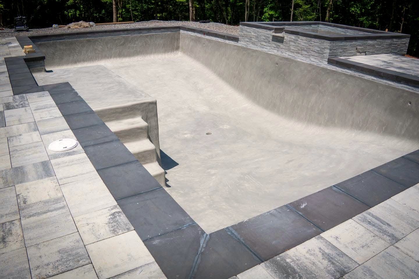 Paver decking and bluestone coping